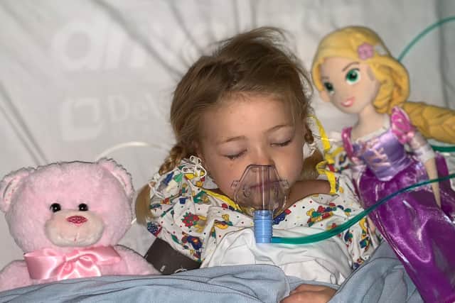 Little Reign Passey, four, in hospital. Credit: Leanne Passey / SWNS
