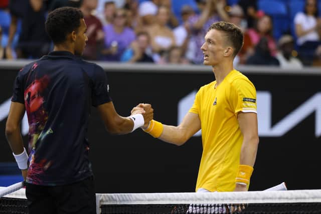 Lehecka embraces Auger-Aliassime following his fourth round win