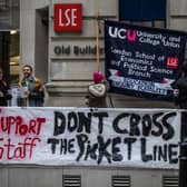 Striking university staff stand at a picket line outside London School of Economics on November 30, 2022 in London, United Kingdom. University staff across the UK are striking over pay, working conditions and pensions