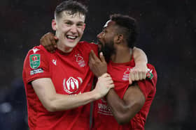 Ryan Yates and Emmanuel Dennis celebrate their win over Wolves in EFL quarter-final