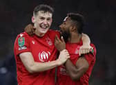Ryan Yates and Emmanuel Dennis celebrate their win over Wolves in EFL quarter-final