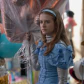 Máiréad Tyers as Jen in Extraordinary, at work in the party supplies store (Credit: Natalie Seery/Disney+)
