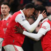 Saka and Gabriel celebrate Arsenal’s second goal against Manchester United