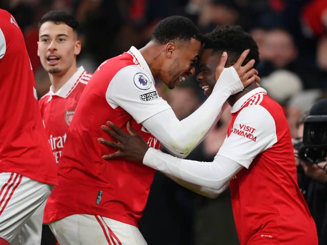 Saka and Gabriel celebrate Arsenal’s second goal against Manchester United