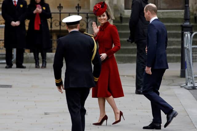 Kate Middleton turned heads in this scarlet Catherine Walker coat dress at the Commonwealth Service in 2020. (Photo by TOLGA AKMEN/AFP via Getty Images)