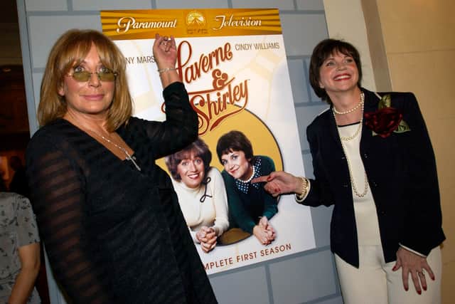 Actors Penny Marshall and Cindy Williams pictured on the Hollywood Walk of Fame on August 12, 2004. (Getty Images)
