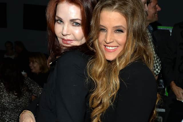 Priscilla Presley celebrates backstage with her daughter Lisa Marie Presley after her performance at 3rd & Lindsley during the 14th Annual Americana Music Festival 2013 (Photo: Rick Diamond/Getty Images for Americana Music Festival)