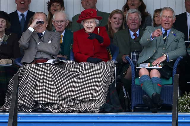 The late Queen and the Duke of Edinburgh sharing a blanket together in 2015. (Photo by Carl Court/Getty Images)