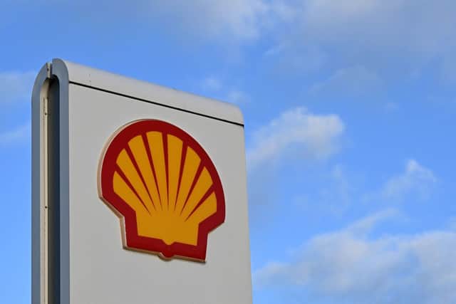 A Shell logo is pictured on a sign outside a Royal Dutch Shell petrol station in Gateshead, north east England on January 31, 2023 (Photo by PAUL ELLIS/AFP via Getty Images)