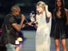 Taylor Swift laughs as she sings about forgiving Kanye West during The Eras Tour in Seattle - feud explained