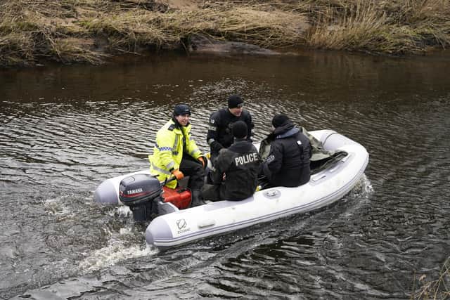 Police officers on the River Wyre, in St Michael’s on Wyre (Photo: PA)