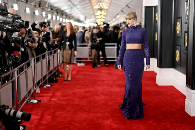 Singer Taylor Swift wore a sparkling midnight blue two piece by Roberto Cavalli.
