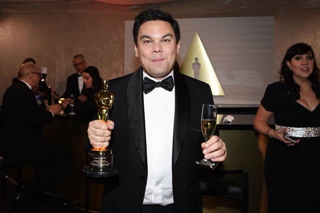 Academy Award winner Robert Lopez poses with award for Best Original Song ‘Remember Me’ for ‘Coco’ at the 90th Annual Academy Awards Governors Ball at Hollywood & Highland Center on March 4, 2018 in Hollywood, California.  (Photo by Kevork Djansezian/Getty Images)