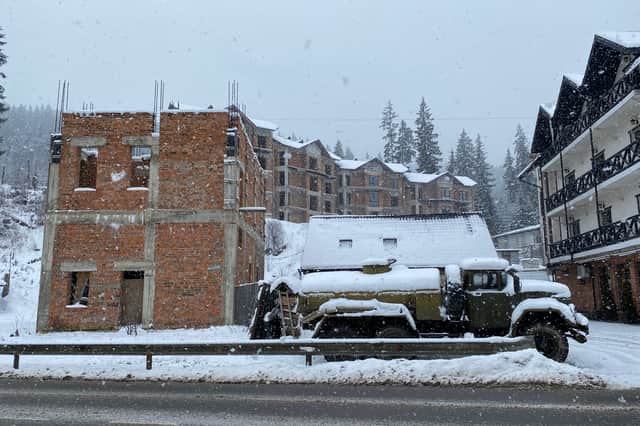 A Soviet ZIL-131 sits beside an unfinished construction project in Bukovel (Image:  William Montgomery)