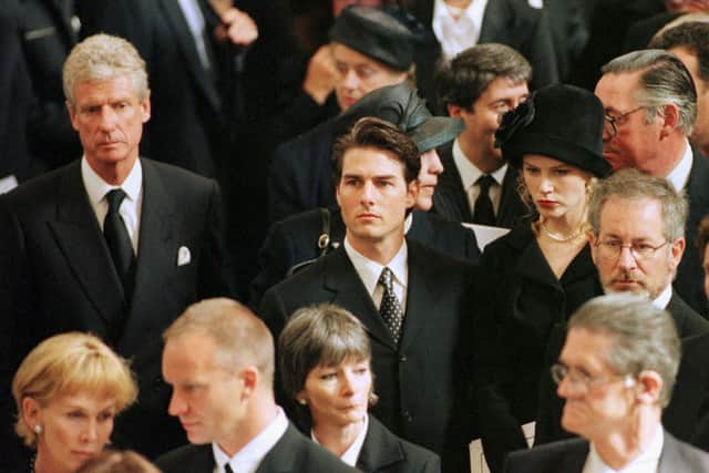 Tom Cruise attended the funeral of Princess Diana. Photograph by  PAUL HACKETT/AFP/GettyImages)