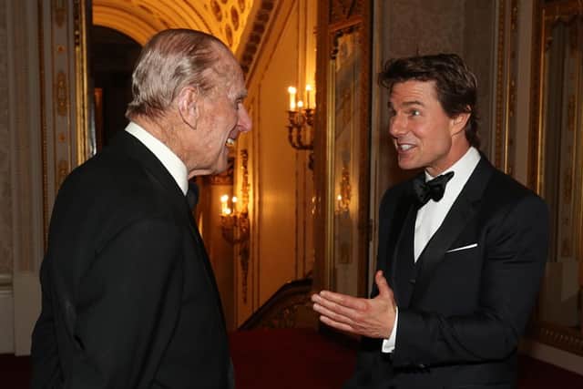 Tom Cruise met the late Duke of Edinburgh at a Buckingham Palace's charity dinner in 2017. (Photo by Jonathan Brady - WPA Pool/Getty Images)