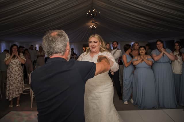 Kayley Stead dancing with her dad. Credit: Neil Jones Photography / SWNS