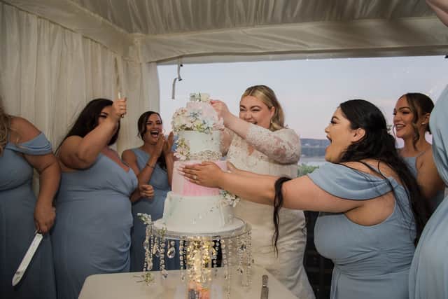 Cutting the cake. Credit: Neil Jones Photography / SWNS