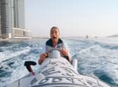 Victoria Goulbourne takes to the waves in Dubai (Image: BBC)