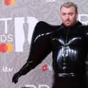 Sam Smith certainly turned heads in his outfit at The BRIT Awards 2023. Photo by ISABEL INFANTES/AFP via Getty Images)