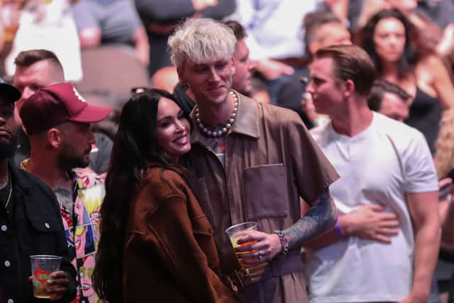 Megan Fox and Machine Gun Kelly attend UFC 261 at VyStar Veterans Memorial Arena on April 24, 2021 in Jacksonville, Florida.  (Photo by Alex Menendez/Getty Images)