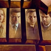Hugh Bonneville as Brian Boyce, Charlotte Spencer as Nikki Jennings, Dominic Cooper as Edwyn Cooper, Jack Lowden as Kenneth Noye, and Tom Cullen as John Palmer in The Gold, their faces reflected in bars of gold (Credit: BBC/Tannadice Pictures/Sally Mais)
