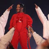 Rihanna performs onstage during the Apple Music Super Bowl LVII Halftime Show (Credit: Getty)