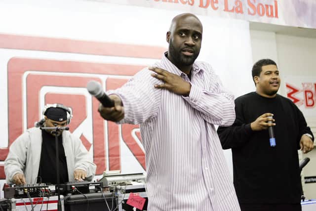 (L-R) Posdnuos, Pasemaster Mase, and Trugoy the Dove of De La Soul perform during an in-store appearance at J&R Music World October 27, 2004 in New York City. (Photo by Scott Gries/Getty Images)