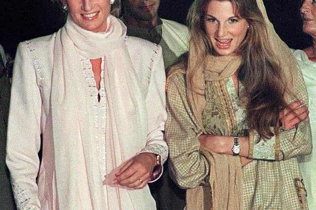 Lady Diana, Princess of Wales (L) heads toward a restaurant for dinner with Jemima Khan (R), the British wife of former Pakistani cricketer Imran Khan, 21 February 1996 in Lahore. Lady Diana is on a private visit to Pakistan to participate in the fund raising campaign for Khan's cancer hospital. AFP PHOTO SAEED KHAN (Photo credit: SAEED KHAN/AFP via Getty Images)