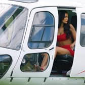 Maya Jama wore a stunning red two-piece by Crolage when she arrived by helicopter to the villa. This photograph is (C) ITV Plc 