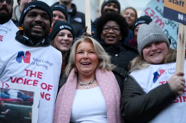 Britain’s Royal College of Nursing (RCN) union head Pat Cullen (C) joins striking nurses at a picket line outside University College Hospital in London. Credit: DANIEL LEAL/AFP via Getty Images