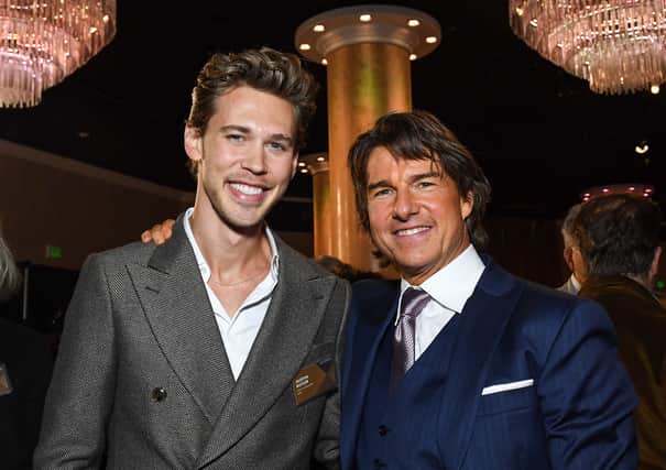 Actors Austin Butler (L) and Tom Cruise arrive at the 95th Annual Oscars Nominees Luncheon at The Beverly Hilton on February 13, 2023 in Beverly Hills, California. (Credit: AFP via Getty Images))