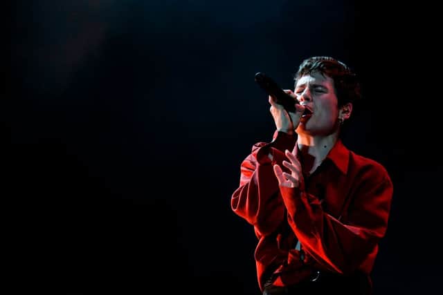 Christine and the Queens performing on stage in 2019 (Photo: SEBASTIEN BOZON/AFP via Getty Images)