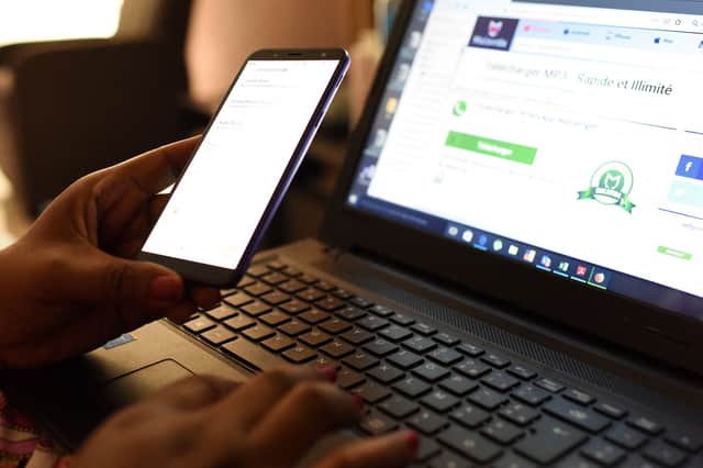 Scams should be reported directly to the social media platform or Action Fraud UK (Photo: AFP via Getty Images)