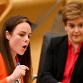 Kate Forbes presents the 2022 Scottish Budget as former First Minister Nicola Sturgeon looks on (Credit: Getty Images)