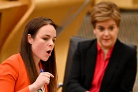 Kate Forbes presents the 2022 Scottish Budget as former First Minister Nicola Sturgeon looks on (Credit: Getty Images)