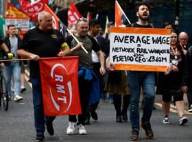 RMT members were due to walk out on 16 March (Photo: Getty Images)