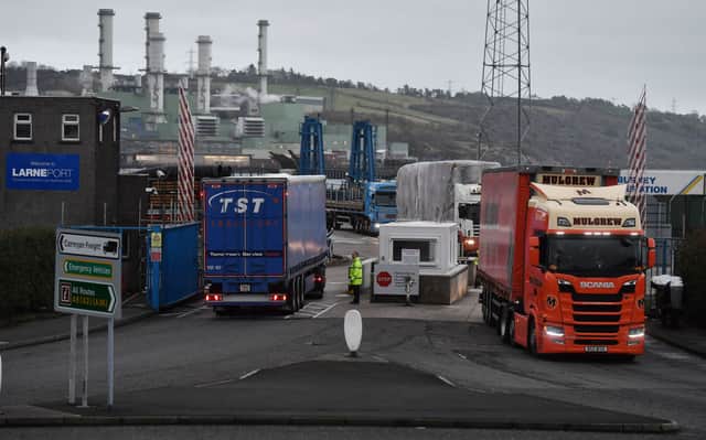 Port officers inspect vehicles at a harbour checkpoint in Larne, Northern Ireland. Credit: Getty Images