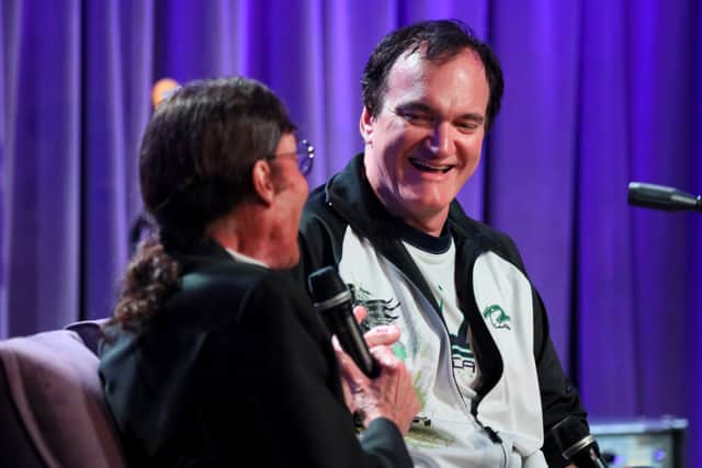 Mark Lindsay and Quentin Tarantino speak onstage at Once Upon A Time In Hollywood: An Evening With Quentin Tarantino & Friends at the GRAMMY Museum on October 02, 2019 in Los Angeles, California. (Photo by Rebecca Sapp/Getty Images for The Recording Academy )