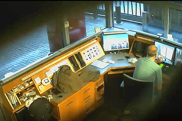 Smith taking video of CCTV monitors in the British Embassy security kiosk – taken on a covert camera - on 6 August 2021 (Photo: Metropolitan Police/Supplied).