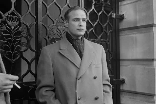 American actor and film director Marlon Brando (1924 - 2004) near South Africa House, Trafalgar Square, London, UK, 10th February 1964. (Photo by Reg Burkett/Daily Express/Hulton Archive/Getty Images)