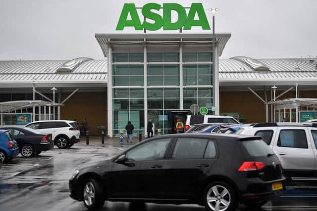 Asda is on track to become the best-paying supermarket in the UK, with staff set to see a 10% pay rise (Photo by BEN STANSALL/AFP via Getty Images).