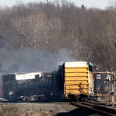 A train derailed in East Palestine, Ohio, with a controlled explosion of hazardous chemicals taking place. (Credit: Getty Images)