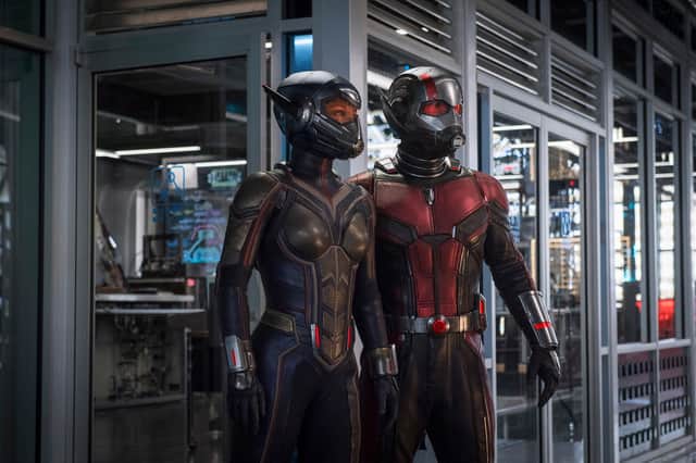 Evangeline Lilly as the Wasp and Paul Rudd as Ant-Man in Ant-Man and the Wasp, wearing their spectacular shrinking suits (Credit: Marvel)