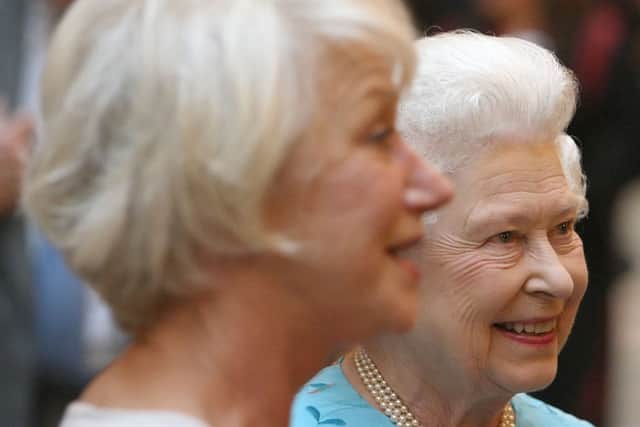 A close up photograph of actress Helen Mirren and Queen Elizabeth 11. Photo by DOMINIC LIPINSKI/POOL/AFP via Getty Images)