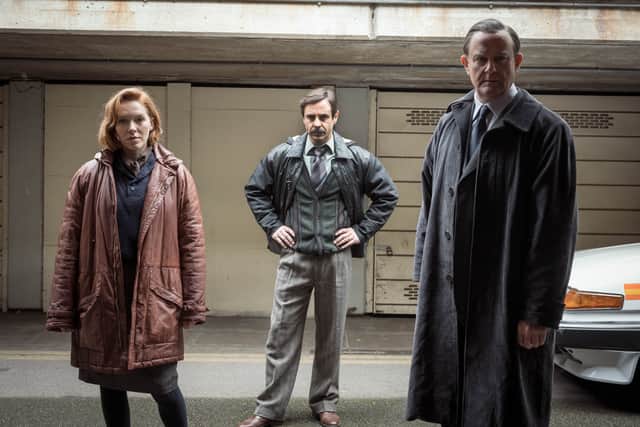 Charlotte Spencer as Nicki Jennings, Emun Elliot as Tony Brightwell, and Hugh Bonneville as Brian Boyce in The Gold (Credit: BBC/Tannadice Pictures/Sally Mais)