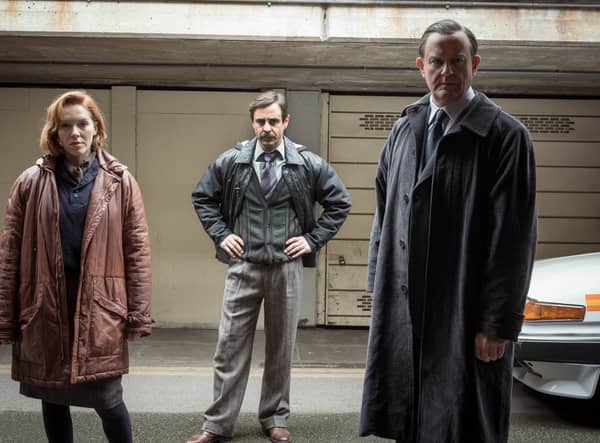 Charlotte Spencer as Nicki Jennings, Emun Elliot as Tony Brightwell, and Hugh Bonneville as Brian Boyce in The Gold (Credit: BBC/Tannadice Pictures/Sally Mais)