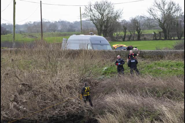 A police diving team at the River Wyre near St Michael’s on Wyre, Lancashire on 19 February. Picture: PA