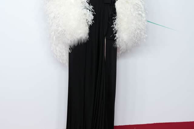 Julianne Moore was sophisticated in a black dress with a white stole. (Photo by Dominic Lipinski/Getty Images)