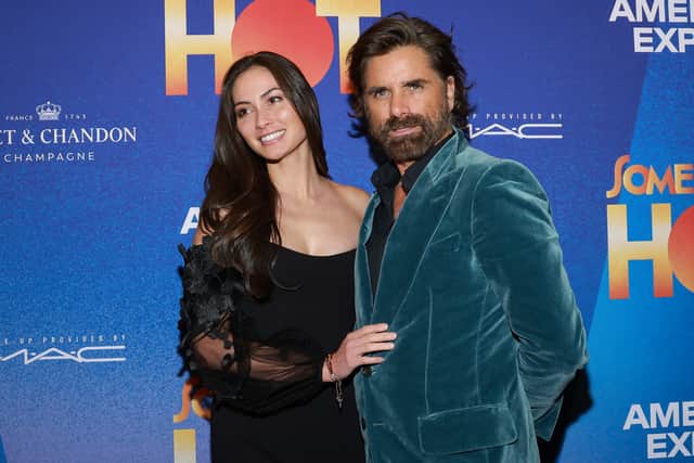 Caitlin McHugh and John Stamos attend "Some Like It Hot" Broadway opening night at Shubert Theatre on December 11, 2022 in New York City. (Photo by Jason Mendez/Getty Images)